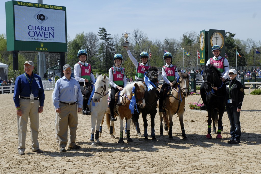 The Tootsie Pops with CEO Tom Adams, President Dan Murphy, and Hill Top Leather Shop's Alyssa Broner.