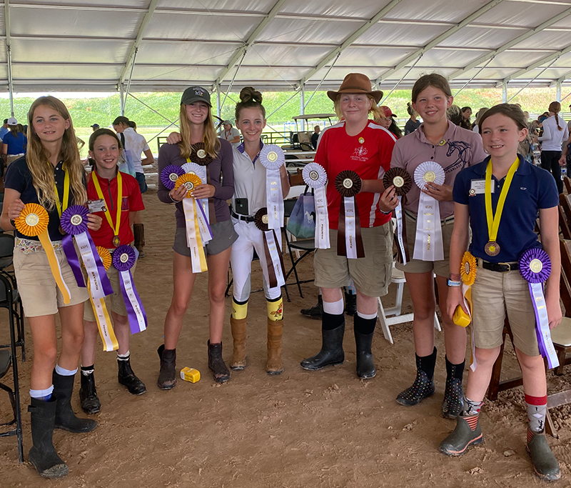 Megan with her two modified teams at Championships Awards