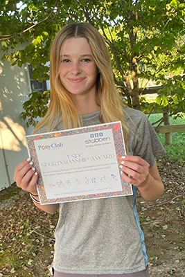 Megan and her certificate from Stubben