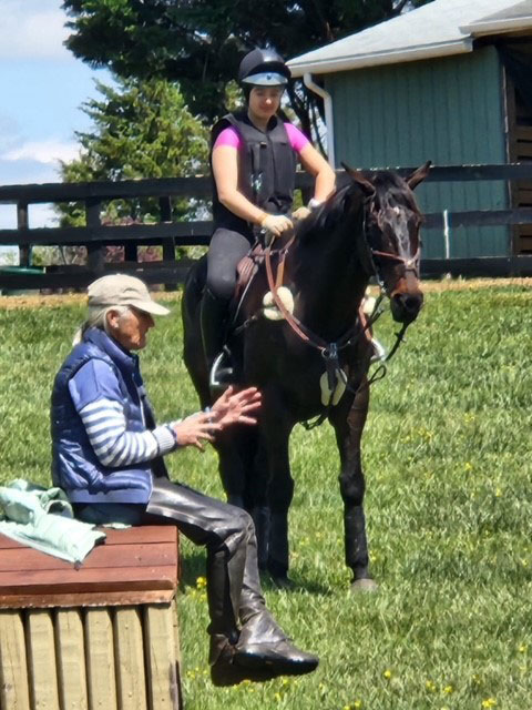 Mia Valdez with a trainer