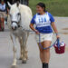 girl leading horse at pony club rally