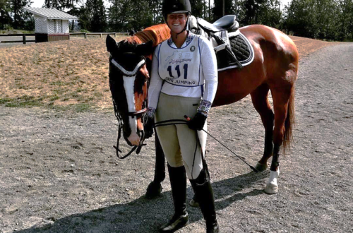 A young woman and her horse looking ready to compete in Eventing.