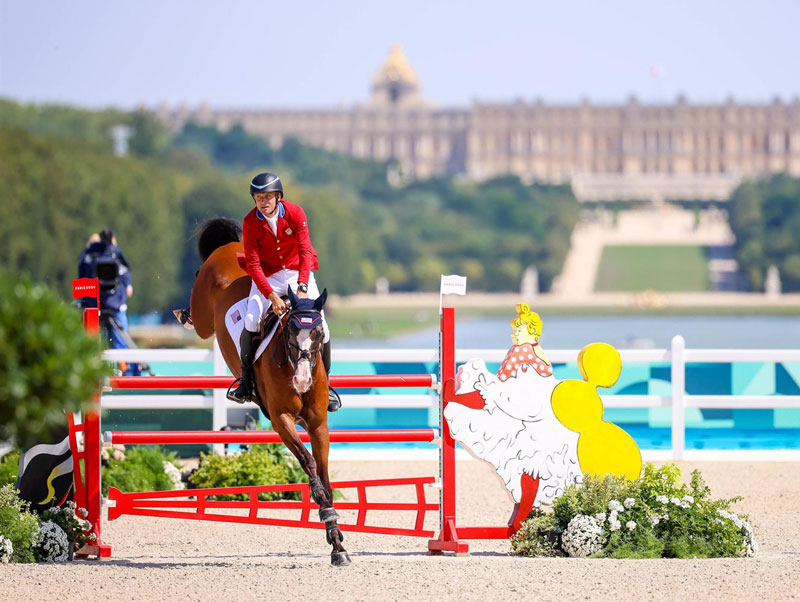 Boyd Martin and Fedarman B in the final phase of Eventing, show jumping, at the 2024 Olympic Games as they compete for team and individual honors. Photo by Devyn Trethewey/U.S. Equestrian