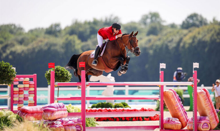 Karl Cook and Caracole de la Roque during the Jumping Team competition before the Final at the Olympic Games