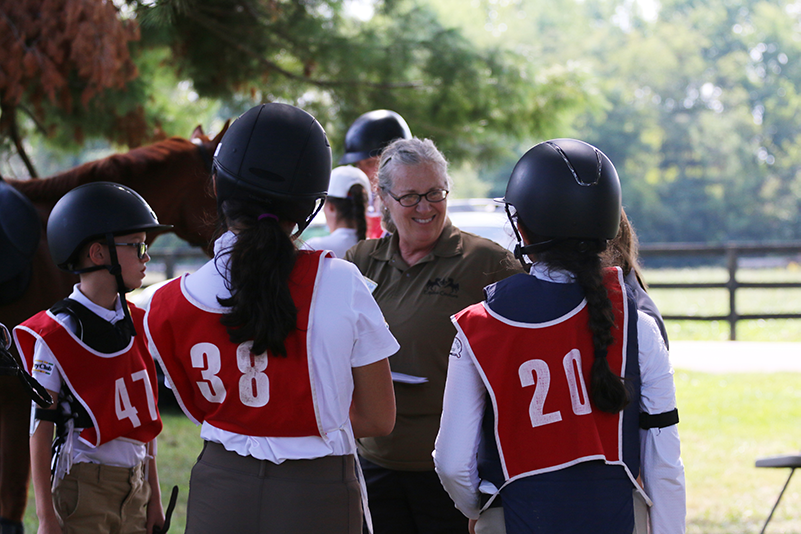 A CHMJ with a group of young riders