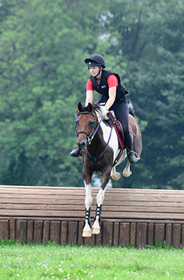 horse-rider-jumping-cross-country-obstacle